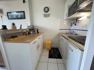 Cuisine ou kitchenette dans l'établissement Les Huniers