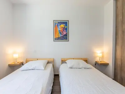 Un ou plusieurs lits dans un hébergement de l'établissement Holiday Home Les Fougères by Interhome
