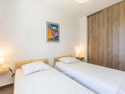 Un ou plusieurs lits dans un hébergement de l'établissement Holiday Home Les Fougères by Interhome