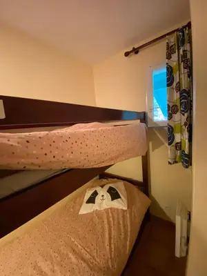 Un ou plusieurs lits dans un hébergement de l'établissement Appartement 3 pièces, 6 perso avec piscine chauffée en saison domaine du golf de Pinsolle