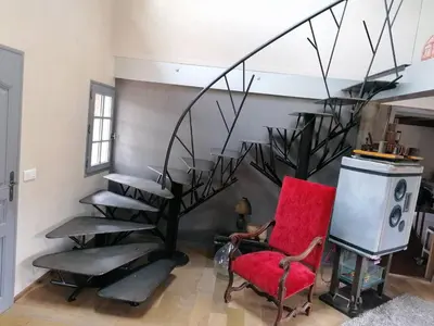 Coin salon dans l'établissement Maison de charme à Mézos avec jardin et terrasse