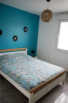 Un ou plusieurs lits dans un hébergement de l'établissement Maison 4 personnes tout confort à 300m de la plage - Clim & Wifi