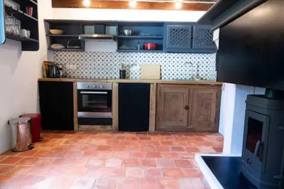 Cuisine ou kitchenette dans l'établissement Le Petit Berdis