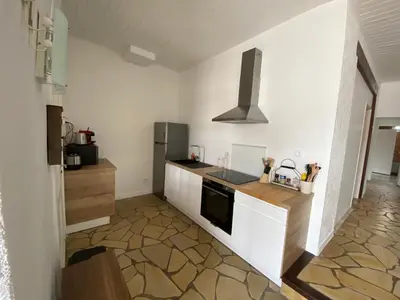 Cuisine ou kitchenette dans l'établissement Le petit courrier