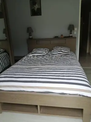 Un ou plusieurs lits dans un hébergement de l'établissement La maison du Barbot Maison 6 couchages