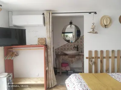 Télévision ou salle de divertissement dans l'établissement Studio CAP à CAP