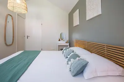Un ou plusieurs lits dans un hébergement de l'établissement Sable Etoilé - Maison cozy espace&confort à 1km du Golf d'Arcachon