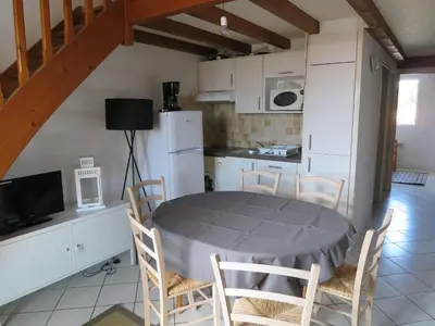 Cuisine ou kitchenette dans l'établissement Les Flots Bleus Etage