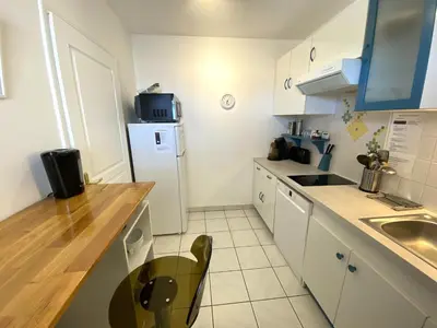 Cuisine ou kitchenette dans l'établissement VILLA MARINA 2 pieces avec parking et wifi centre