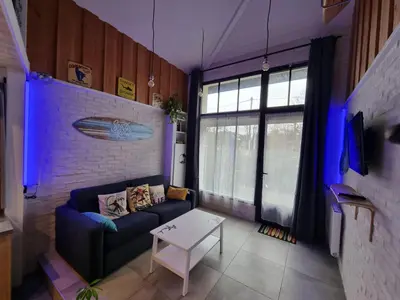 Coin salon dans l'établissement T1bis à La Hume