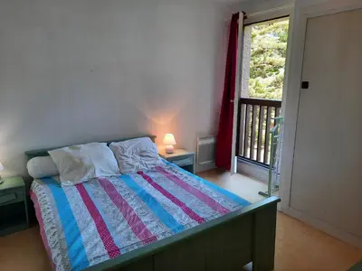 Un ou plusieurs lits dans un hébergement de l'établissement Appartement Lumineux à Seignosse, Proche Plage, Commerces et Activités, Parking, Wifi et Balcon - FR-1-239-813