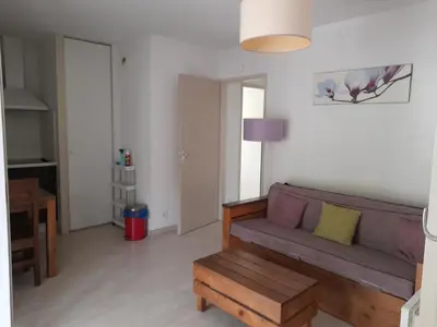 Coin salon dans l'établissement Appartement les Terrasses du Lac