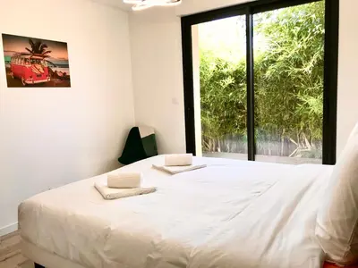 Un ou plusieurs lits dans un hébergement de l'établissement La Villa Canopée - Piscine chauffée-Fibre-Clim-Jacuzzi