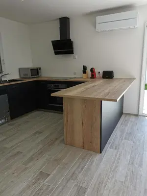 Cuisine ou kitchenette dans l'établissement Maison Proche Centre Ville