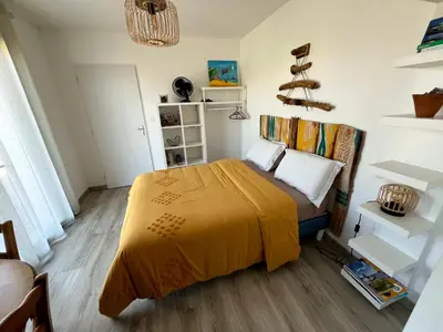 Un ou plusieurs lits dans un hébergement de l'établissement La chambre de Séraphine