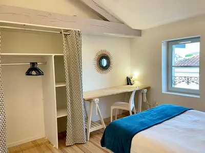 Un ou plusieurs lits dans un hébergement de l'établissement Le Cocon Landais - Clim - Balcon - Central - Spacieux - Lumineux