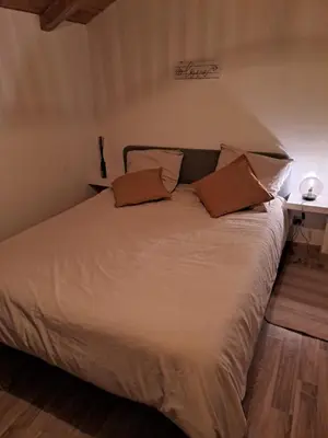 Un ou plusieurs lits dans un hébergement de l'établissement Maisonnette vue sur forêt