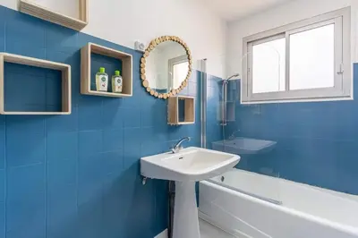 Salle de bains dans l'établissement Maison Mimizan plage