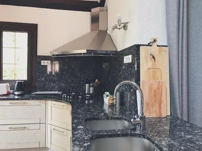 Cuisine ou kitchenette dans l'établissement La bergerie des Landes