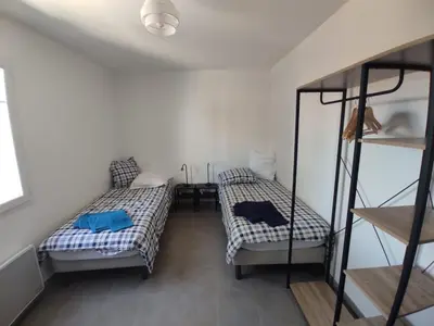 Un ou plusieurs lits dans un hébergement de l'établissement 3*** Mimizan 800m plage sud - villa 8/10 pers