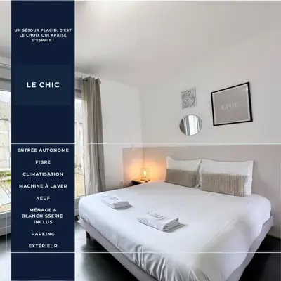 Un ou plusieurs lits dans un hébergement de l'établissement Le Chic - Parking - Extérieur - Fibre - Calme