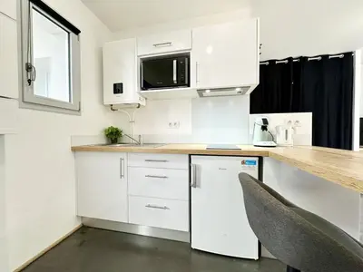 Cuisine ou kitchenette dans l'établissement Le Chic - Parking - Extérieur - Fibre - Calme