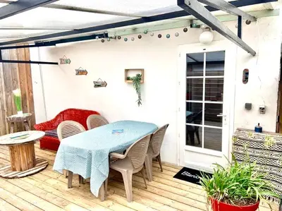Coin salon dans l'établissement Maisonnette Bassin d'Arcachon