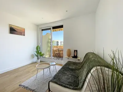 Coin salon dans l'établissement Au pieds des dunes