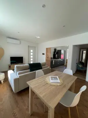 Télévision ou salle de divertissement dans l'établissement Un logement cosy proche des Ports
