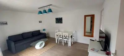 Coin salon dans l'établissement chalet Le Ticaco Soustons plage avec WiFi satellite