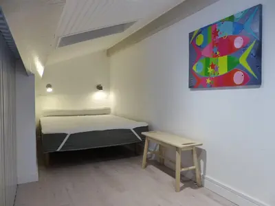 Un ou plusieurs lits dans un hébergement de l'établissement Les Rives de Capbreton Villa patio Résidence pour 4 personnes