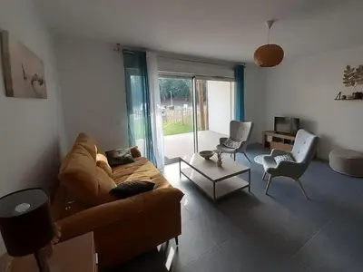 Coin salon dans l'établissement Dune Blanche 300 m de l'Océan, appartement neuf 6 personnes