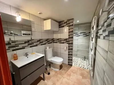 Salle de bains dans l'établissement La Plage