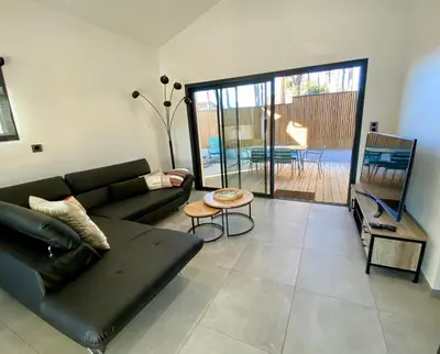 Coin salon dans l'établissement Villa Palot à la plage