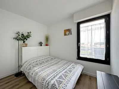Un ou plusieurs lits dans un hébergement de l'établissement En bord de mer