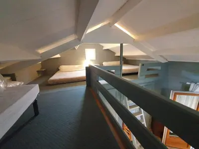 Un ou plusieurs lits dans un hébergement de l'établissement Chalet calme et agréable