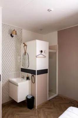 Salle de bains dans l'établissement L'Aparté