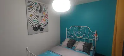 Un ou plusieurs lits dans un hébergement de l'établissement EntreLac&Océan1 - chambre d'hôtes chez l'habitant, Entrée et terrasse privée- cyclotouristes bienvenue
