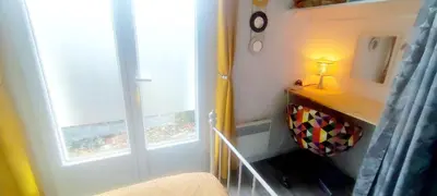 Un ou plusieurs lits dans un hébergement de l'établissement EntreLac&Océan1 - chambre d'hôtes chez l'habitant, Entrée et terrasse privée- cyclotouristes bienvenue