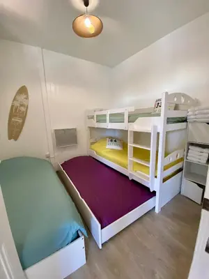 Un ou plusieurs lits dans un hébergement de l'établissement Bel appartement en hyper-centre - linge inclus