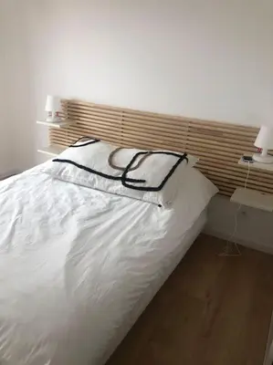 Un ou plusieurs lits dans un hébergement de l'établissement Maison La teste de Buch 3 chambres