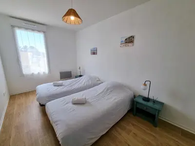 Un ou plusieurs lits dans un hébergement de l'établissement La cabane de Mimimael Duplex 4 pers proche océan