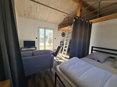 Un ou plusieurs lits dans un hébergement de l'établissement Studio de 35 m2
