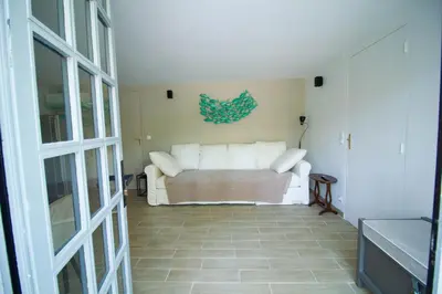 Un ou plusieurs lits dans un hébergement de l'établissement Pyla sur mer proche plages appartement avec piscine partagée