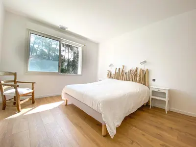 Un ou plusieurs lits dans un hébergement de l'établissement Appartement Céleste - Villas Lake and Sea