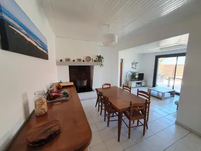 Coin salon dans l'établissement Maison calme à 50 m de la plage