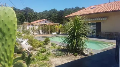 Piscine de l'établissement Chambres d'hôtes, meublé tourisme de France étoilé, 5 minutes de l'océan, 2 vélos à disposition ou située à proximité