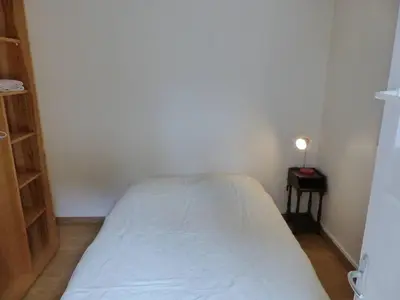 Un ou plusieurs lits dans un hébergement de l'établissement Villa LA TEIGNOUSE entre lac et océan terrasse et jardinet pour 6 personnes