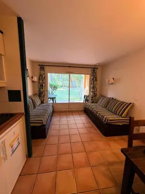 Coin salon dans l'établissement Le Domaine du Golf de Pinsolle - maeva Home - Appartement 2 pièces 5 personnes - Sélection MAE-8544