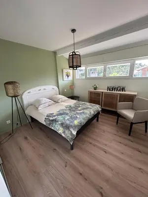 Un ou plusieurs lits dans un hébergement de l'établissement Villa 8 personnes proche d'Hossegor au bord du Golf de Pinsolle